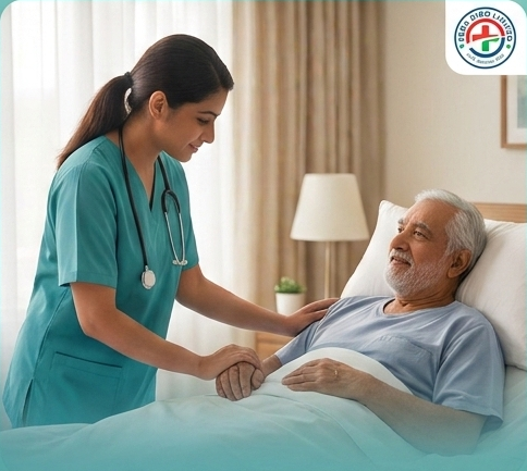 Caregiver assisting an elderly patient at home